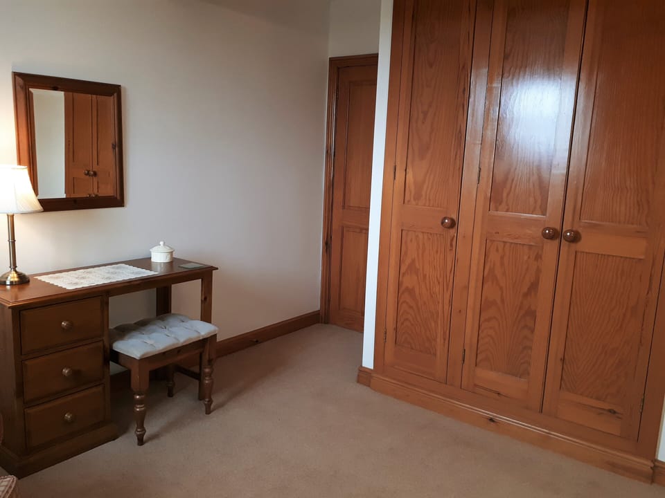Twin Bedroom with Zip n Link for super king option. Third single bed available