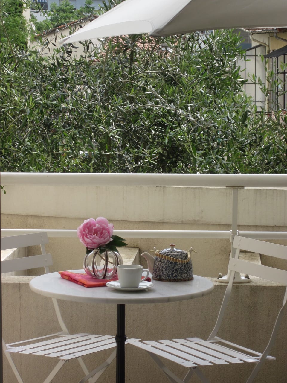 Sunny terrace overlooking pool