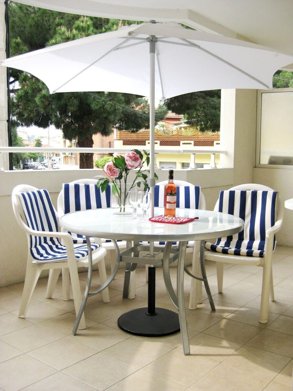 Front Terrace  with BBQ and sun lounger