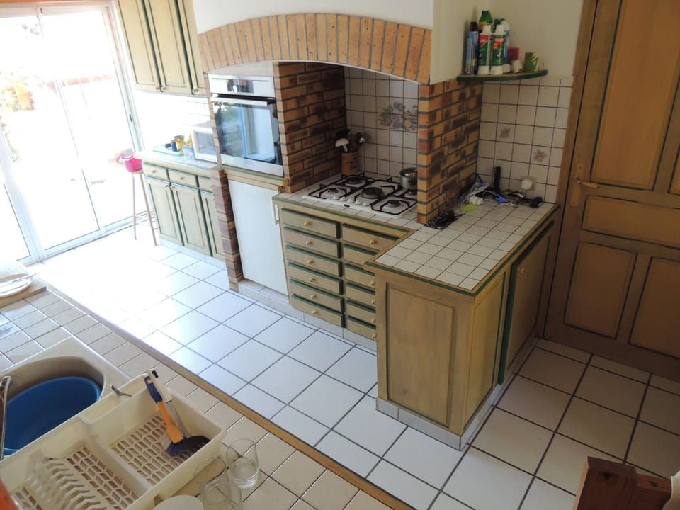 Well equipped kitchen and rear sliding doors to courtyard