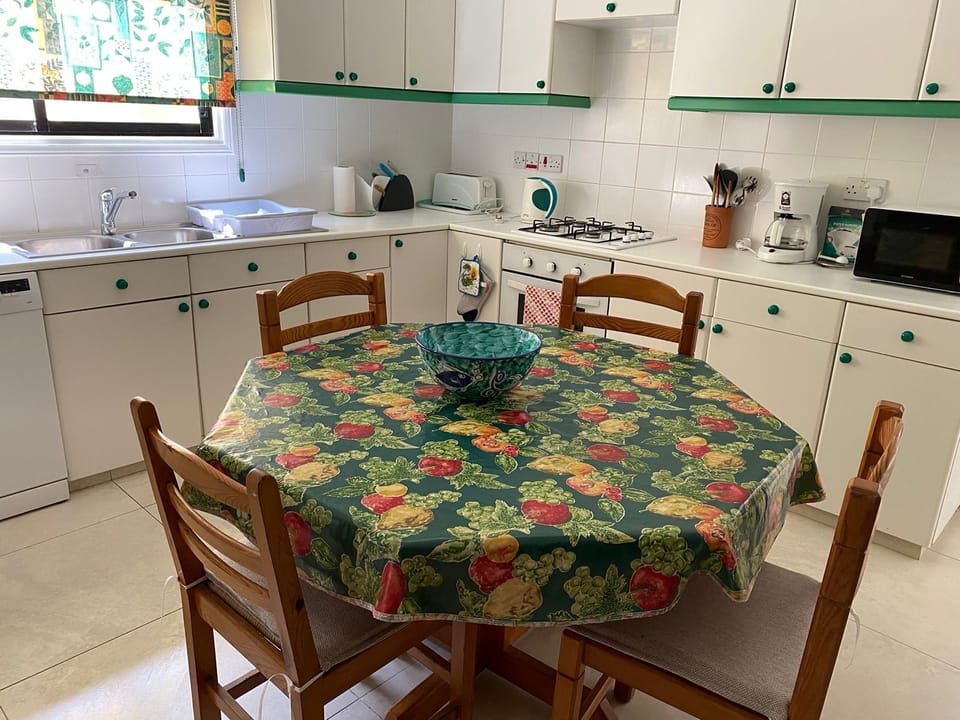 Our well equipped kitchen leading out to the patio