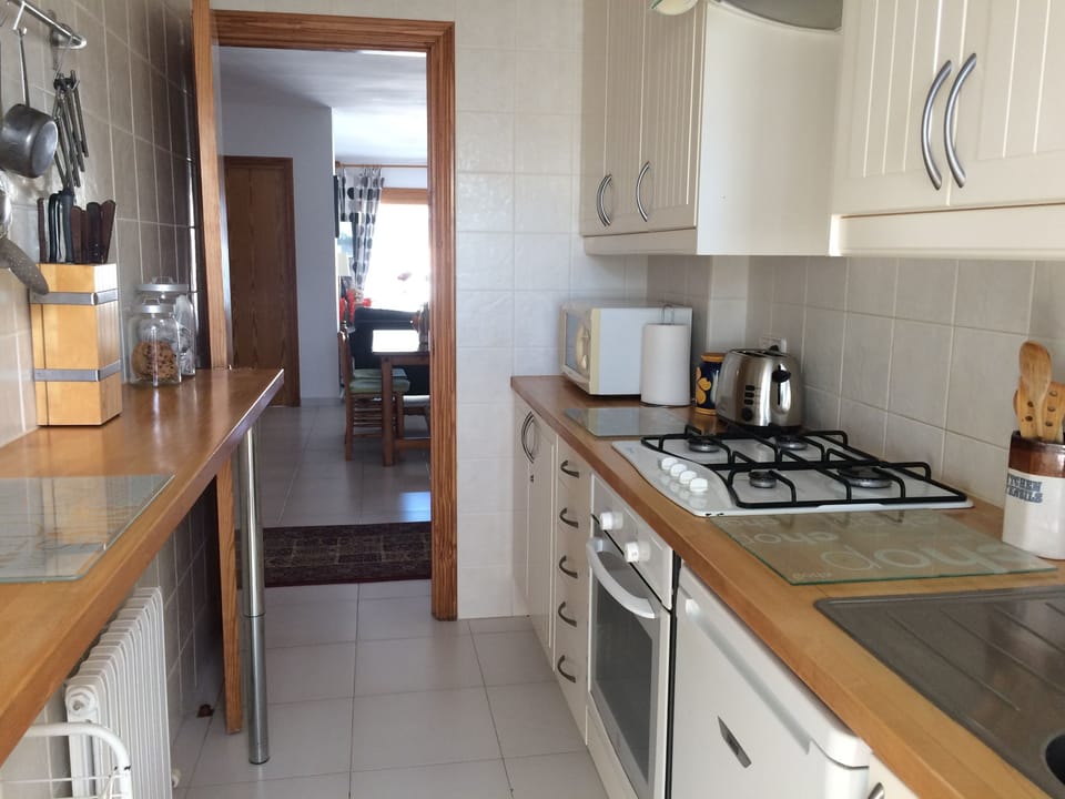 Kitchen leads into open plan living area