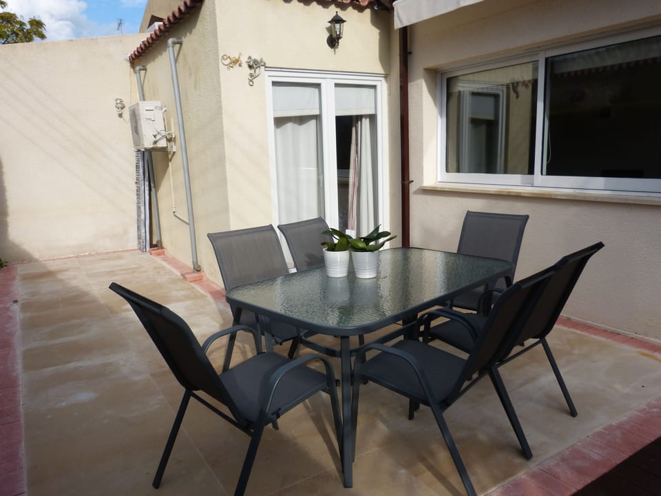 With motorised awning.
