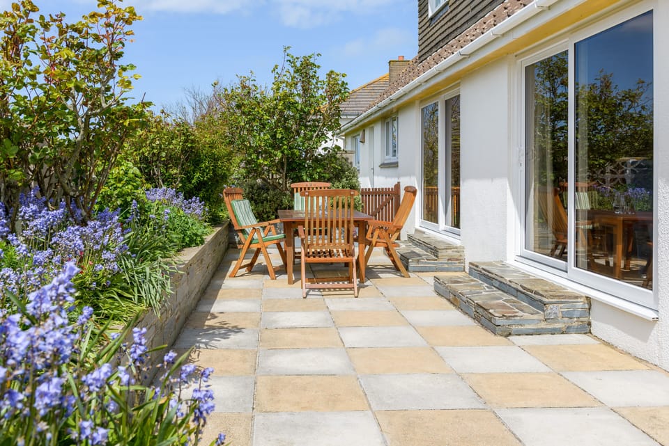 Sunny Patio  with dining table and loungers