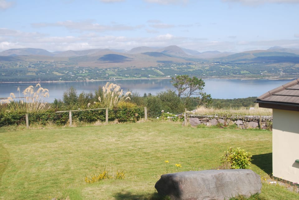 View side of house/back yard (soccer field)