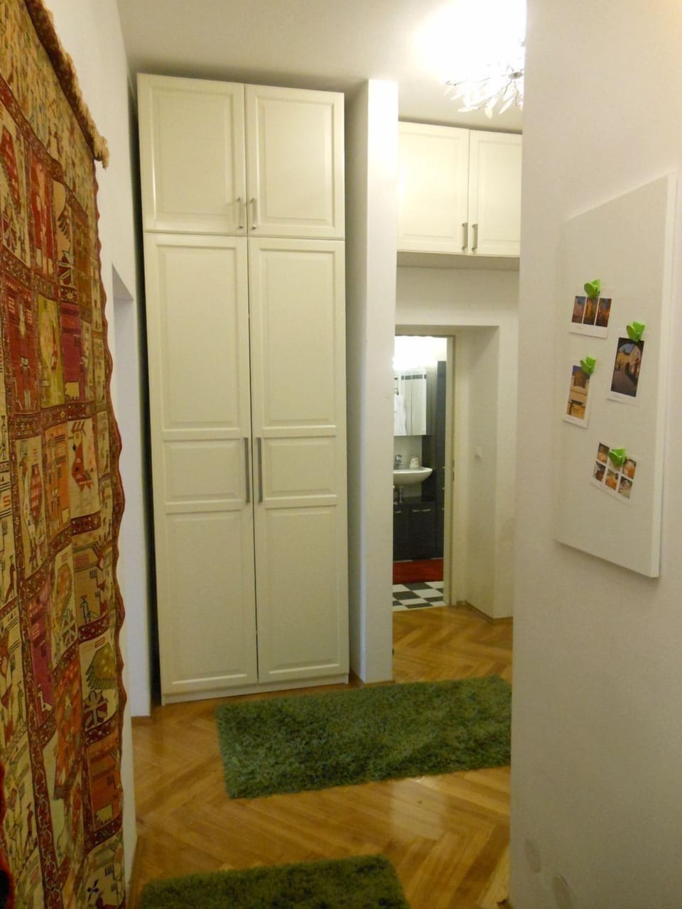 View from kitchen area towards hallway and bathroom