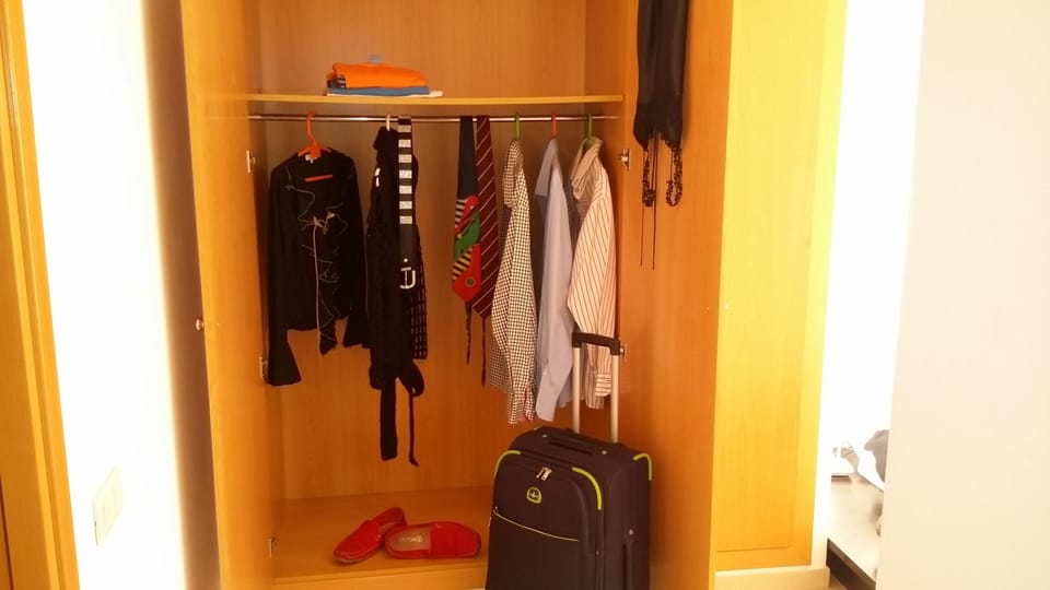Bathroom I:
bath-tube/shower, Bidet, hair dryer, towels, shampoo, soap.