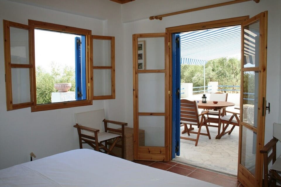 Bedroom 1 with exit to patio