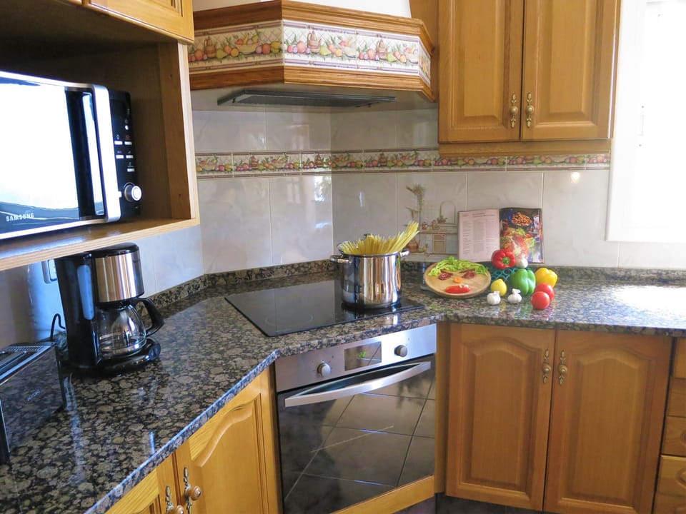 fridge, dish washer, microwaves, toaster, coffee machine, kettle