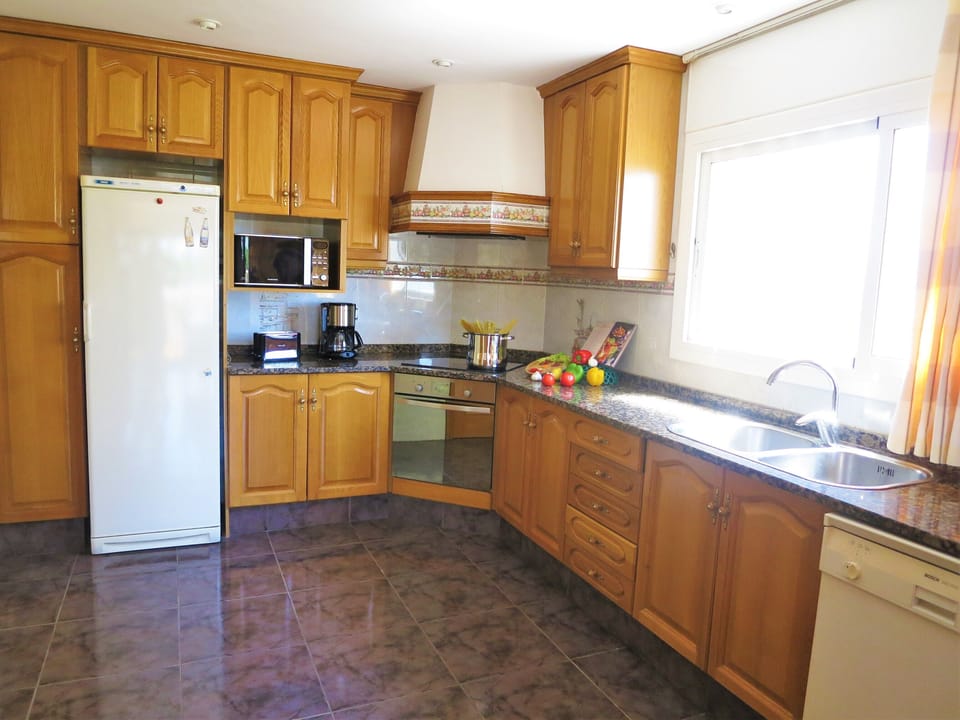 fridge, dish washer, microwaves, toaster, coffee machine, kettle.