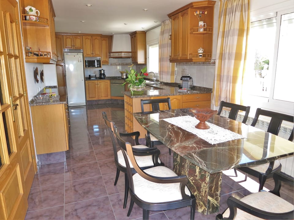 fridge, dish washer, microwaves, toaster, coffee machine, kettle.