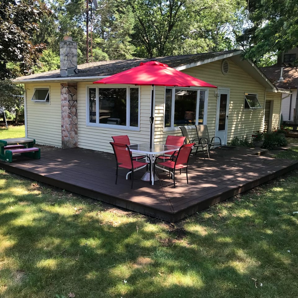 large yard - lots of room to play. View lake/dunes. Access to shared lake lot.