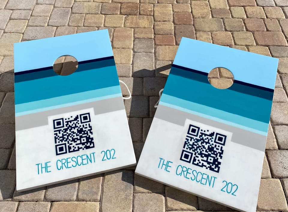 Beach Cornhole! 
Beach closet also has coolers, bocce, & water chairs.