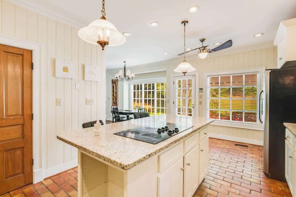 Our modern kitchen with stainless steel appliances and ample counter space is perfect for cooking delicious meals.