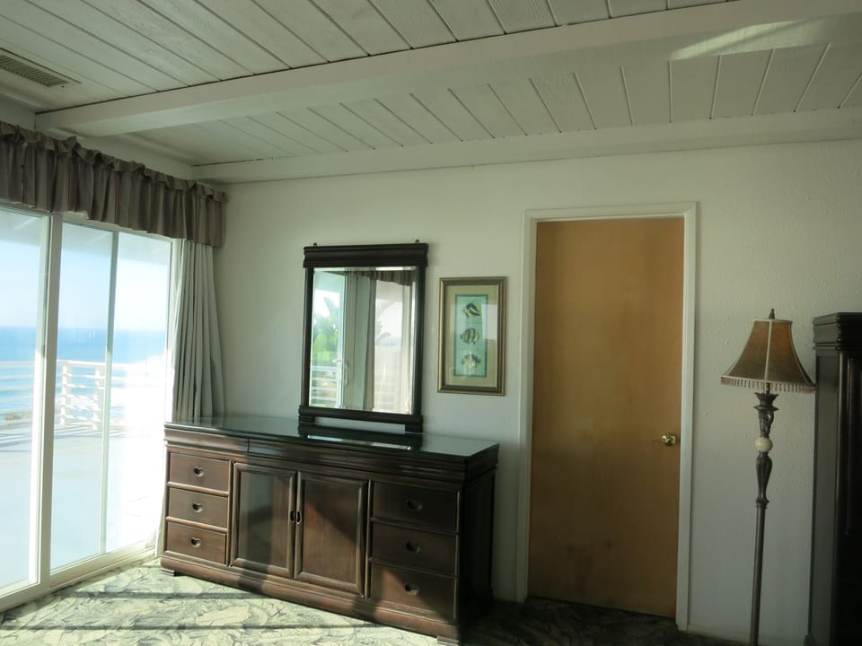 Oceanfront deck left,  bathroom door right