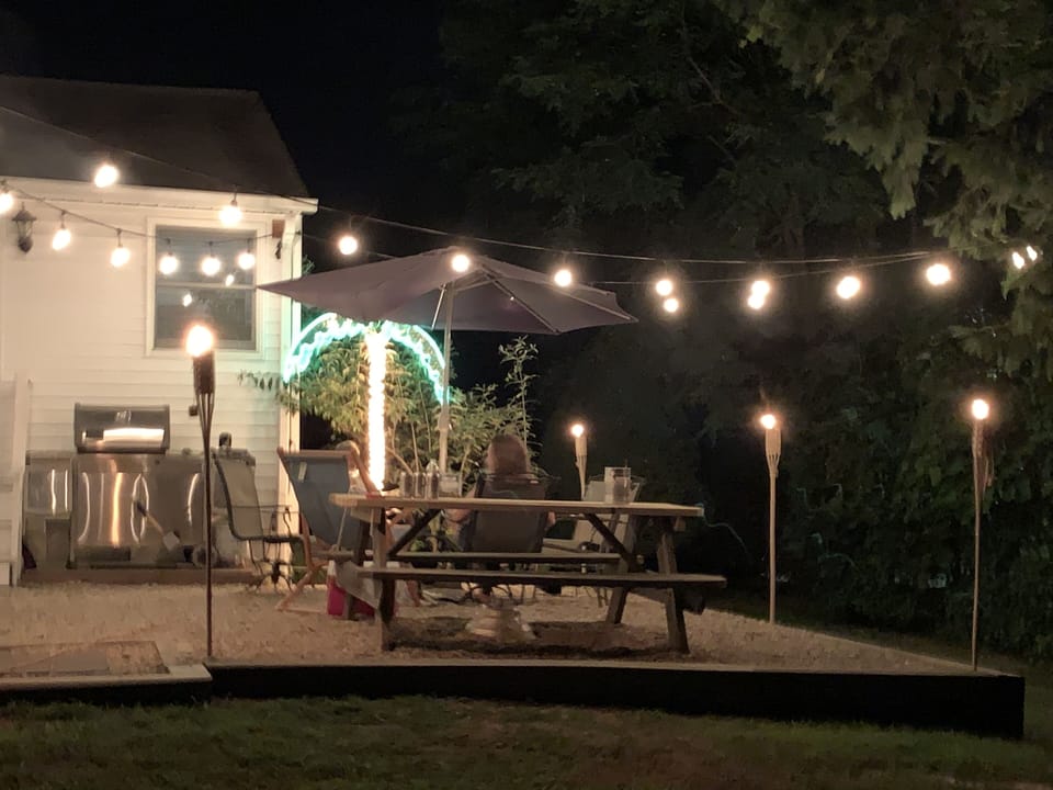 Patio at light with string lights

