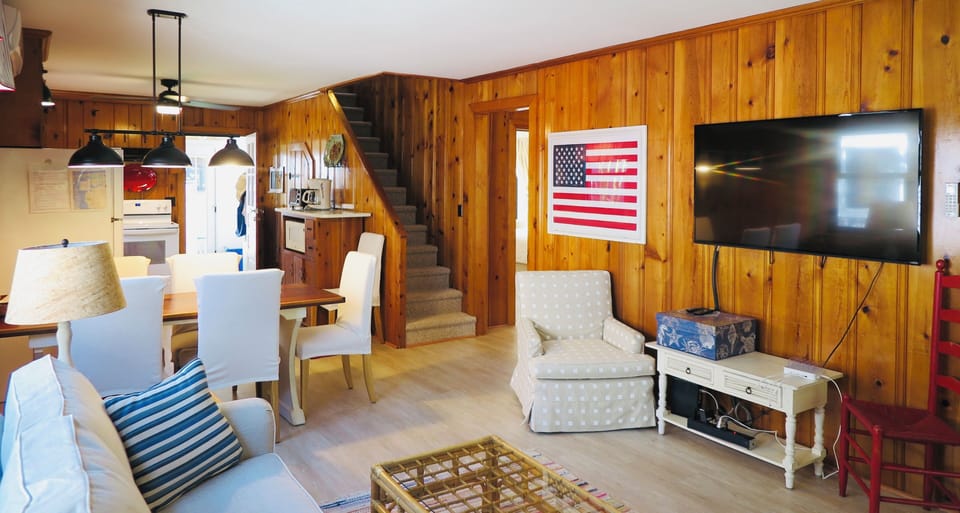 Stairs, in background, to bedrooms (2), common area, business center, & bathroom
