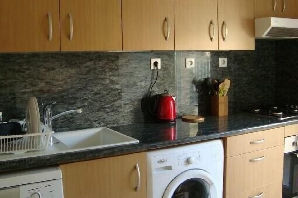 Kitchen opening onto terrace