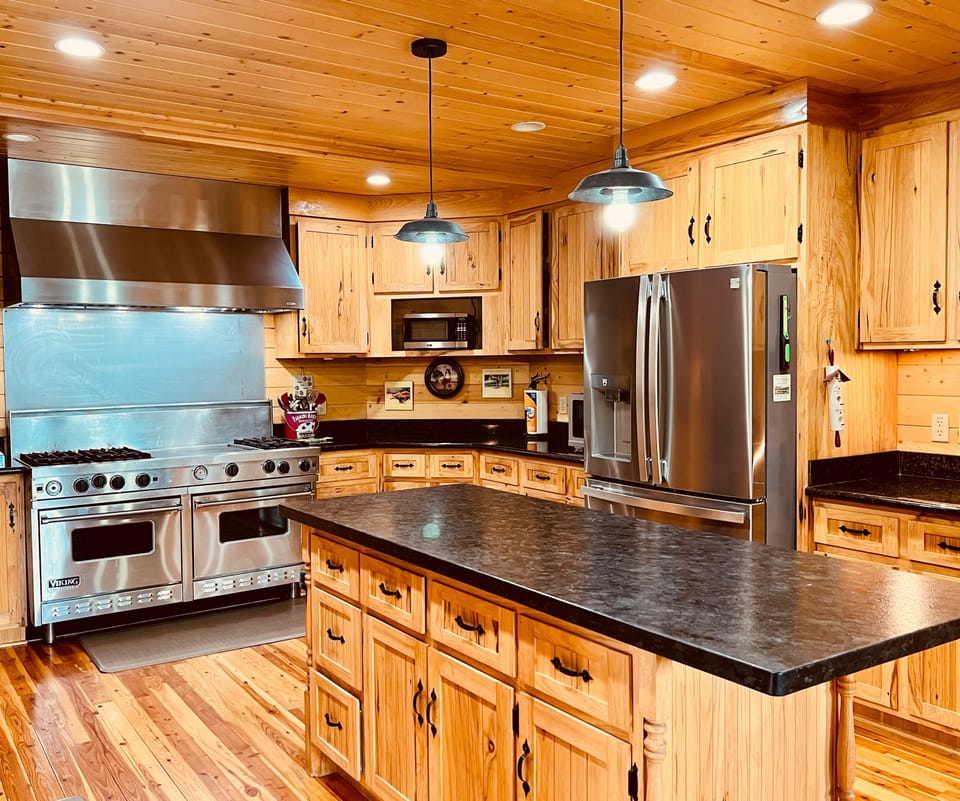 gourmet kitchen with stainless steel appliances