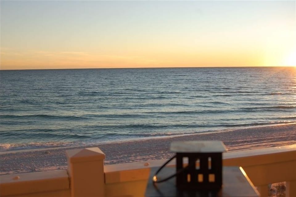 From the deck, the sun begins to set.