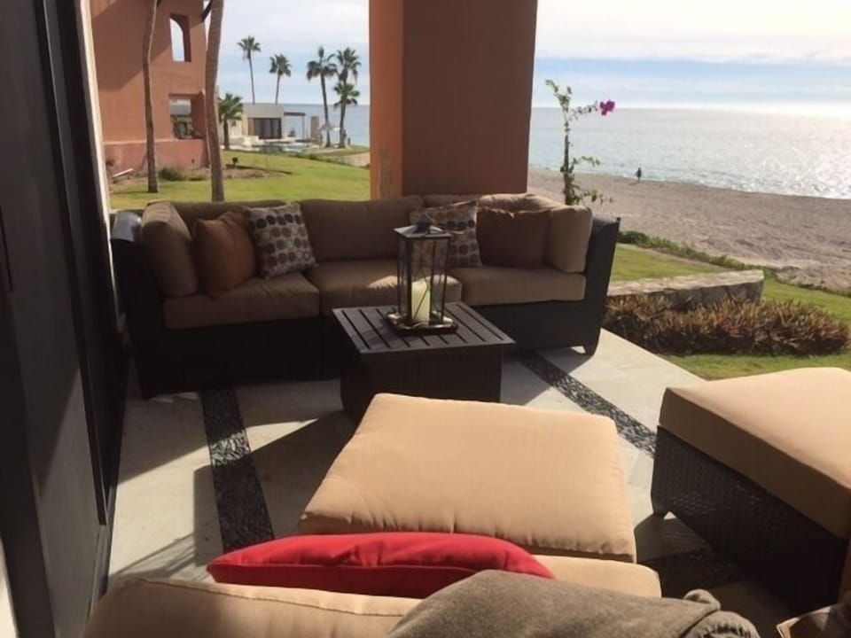 Patio 1 directly from master bedrm-grassy area then beach....nap time :-)