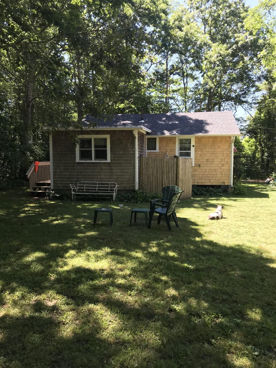 back of house with hot and cold outdoor shower