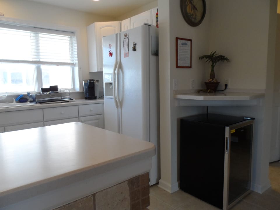 kitchen with beverage refrigerator (newer refrig not pictured-replaced 2024)