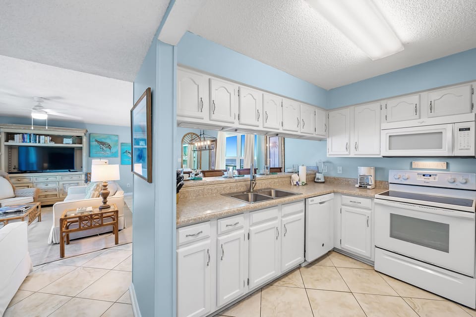 Open floor plan with living room, dining room, bar area & kitchen all connected!