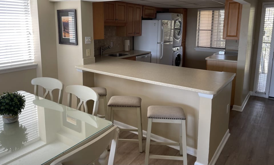 Dining table for 6 plus 3 counter stools - ready for your family dining! 