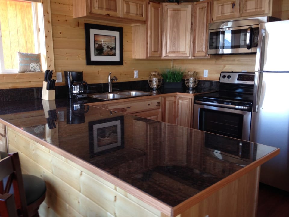 Kitchen is fully furnished with everything you need to start cooking.