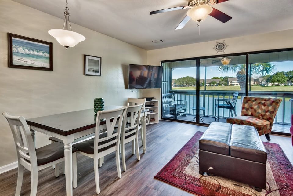 Living area leads out to screened in deck