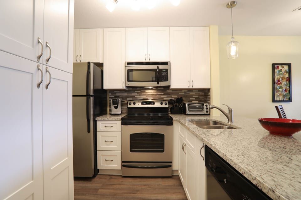 Fully equipped kitchen with granite countertops