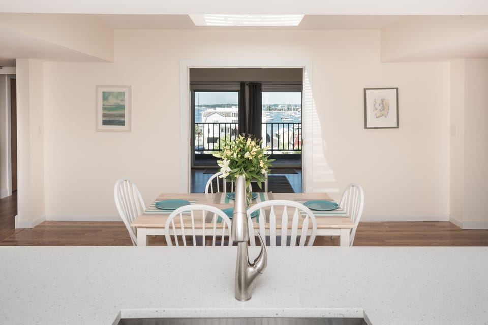 Enjoy views of Newport Harbor from the kitchen and dining room.