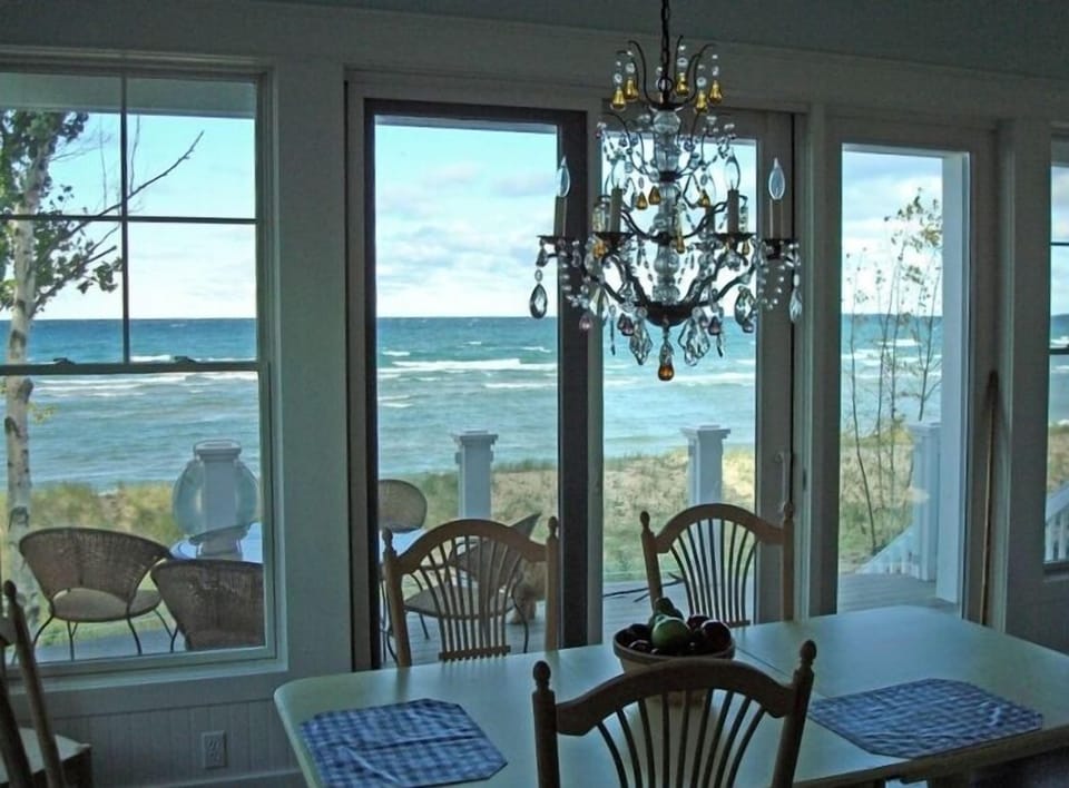 Dining area overlooking deck and Lake Michigan