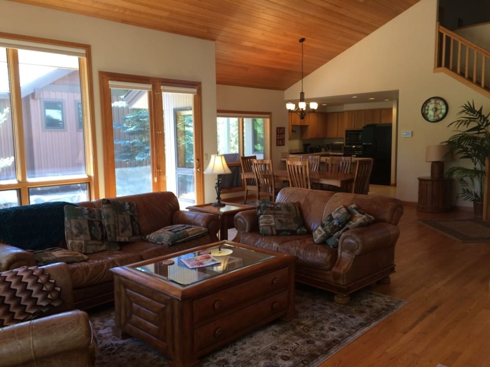 Great room flows to dining room & kitchen for cohesive living & gathering.