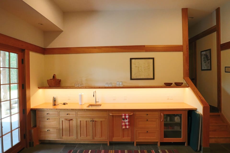 Downstairs kitchenette for easy patio drinks and buffet hosting