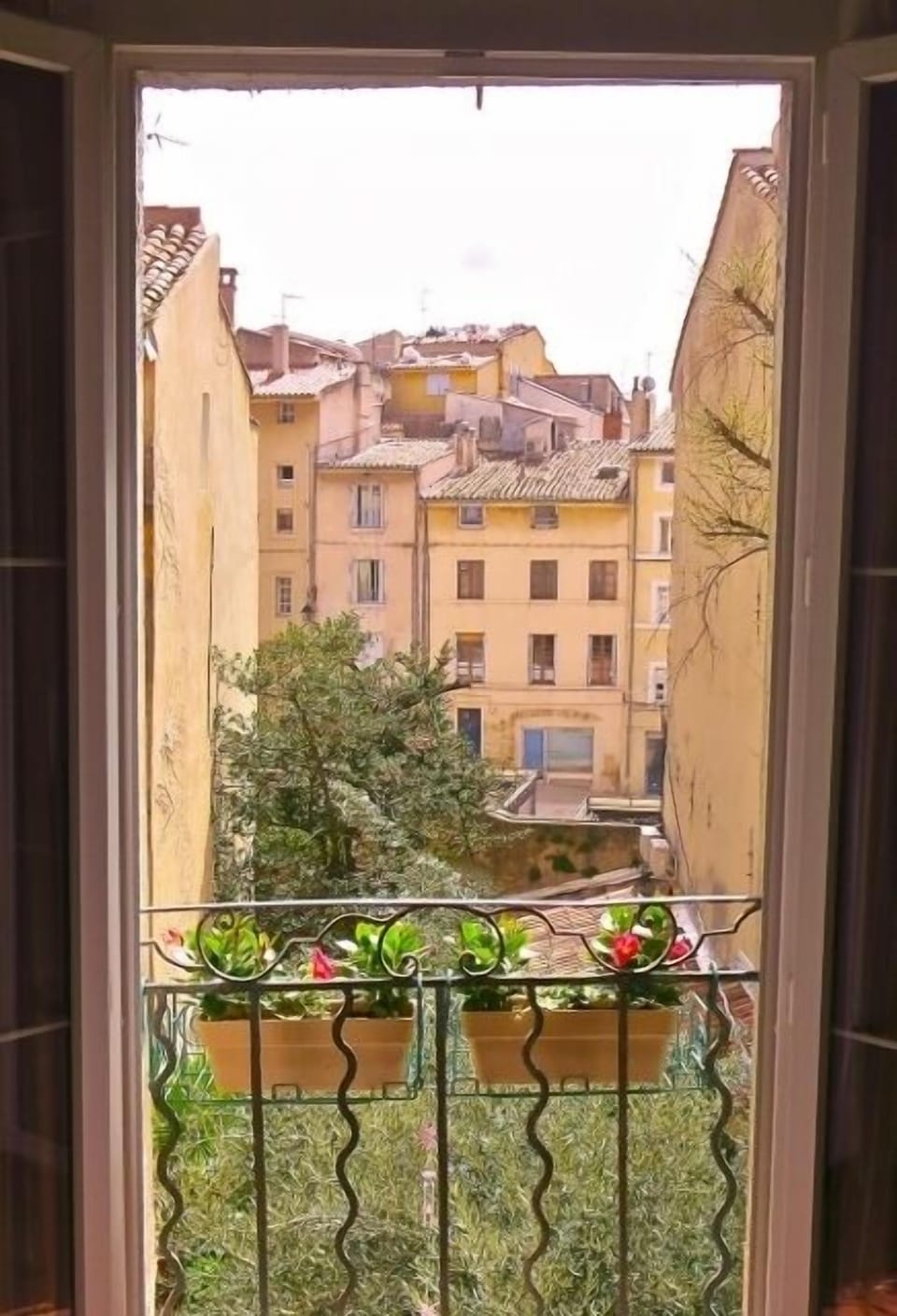 View from the living room. The square is in the distance, the garden below.