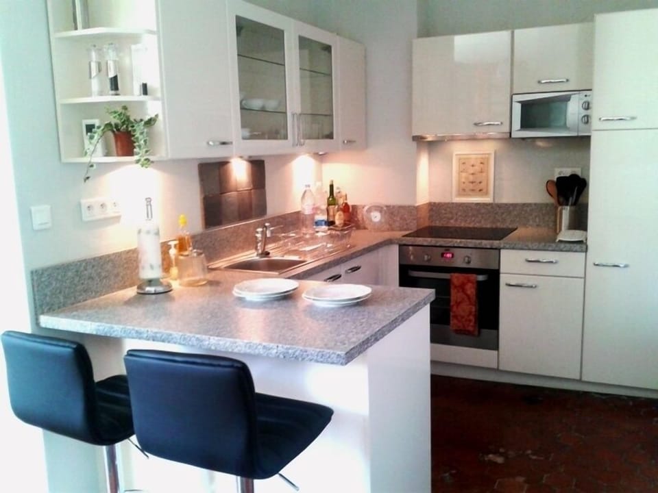 New appliances shine in this renovated kitchen featuring all modern conveniences