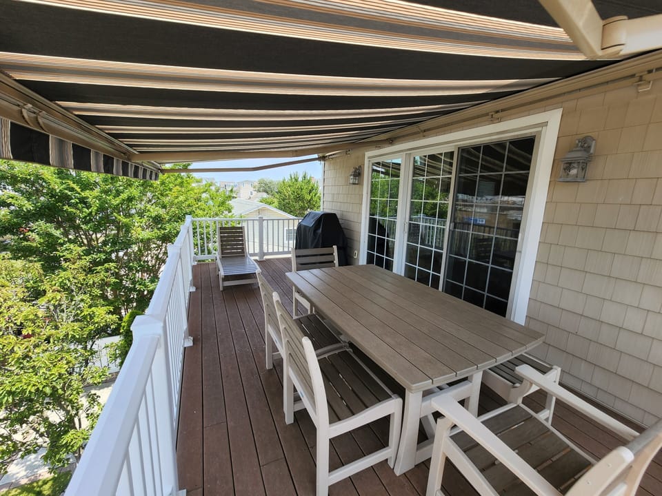 2nd Floor Deck with Power Awning, Gas Grill, & Chaise Sun Lounger
