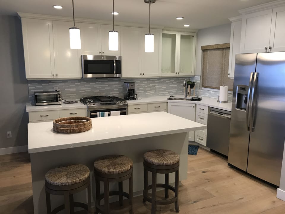 Gourmet kitchen with quartz countertops.  Fully equipped.  High end appliances.