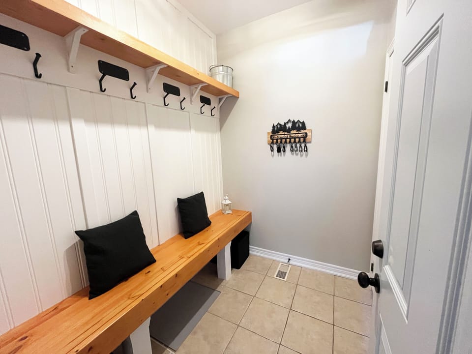 Newly renovated ski room connecting the garage and kitchen.