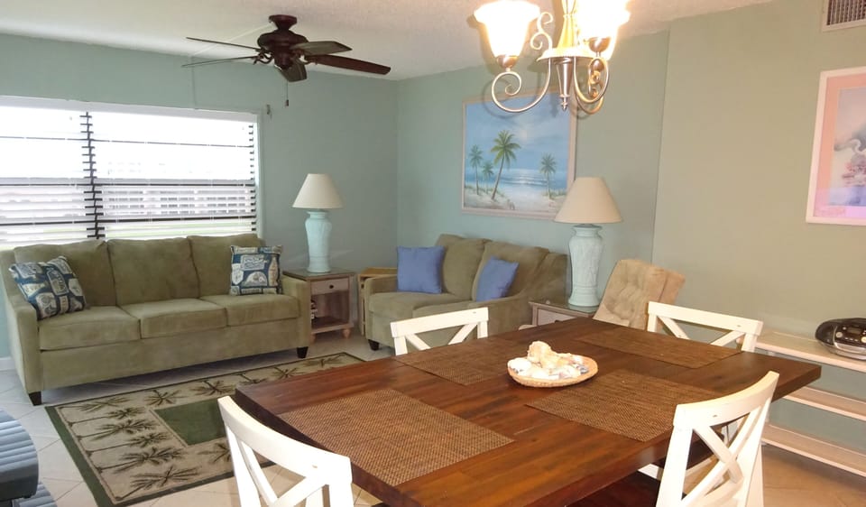 View of dinning table and living room area.