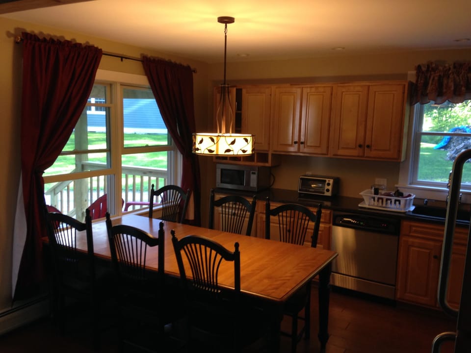 Granite counter tops, Birch-wood cabinetry and stainless steel appliances.