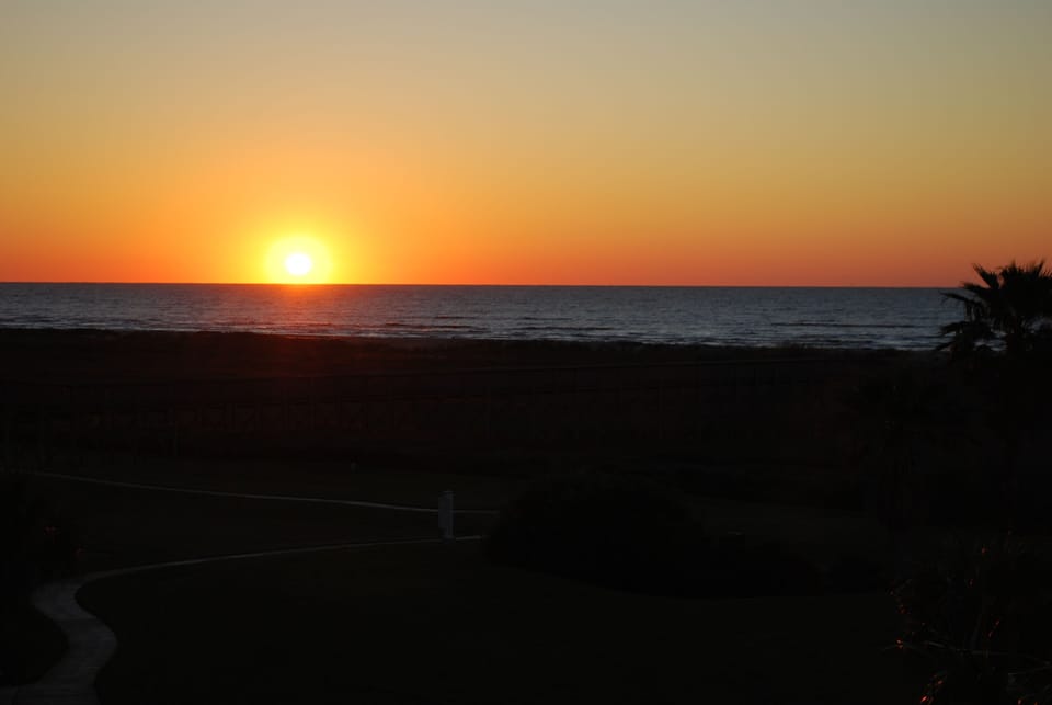 Sunrise over the Gulf of Mexico can be viewed from your private large balcony.