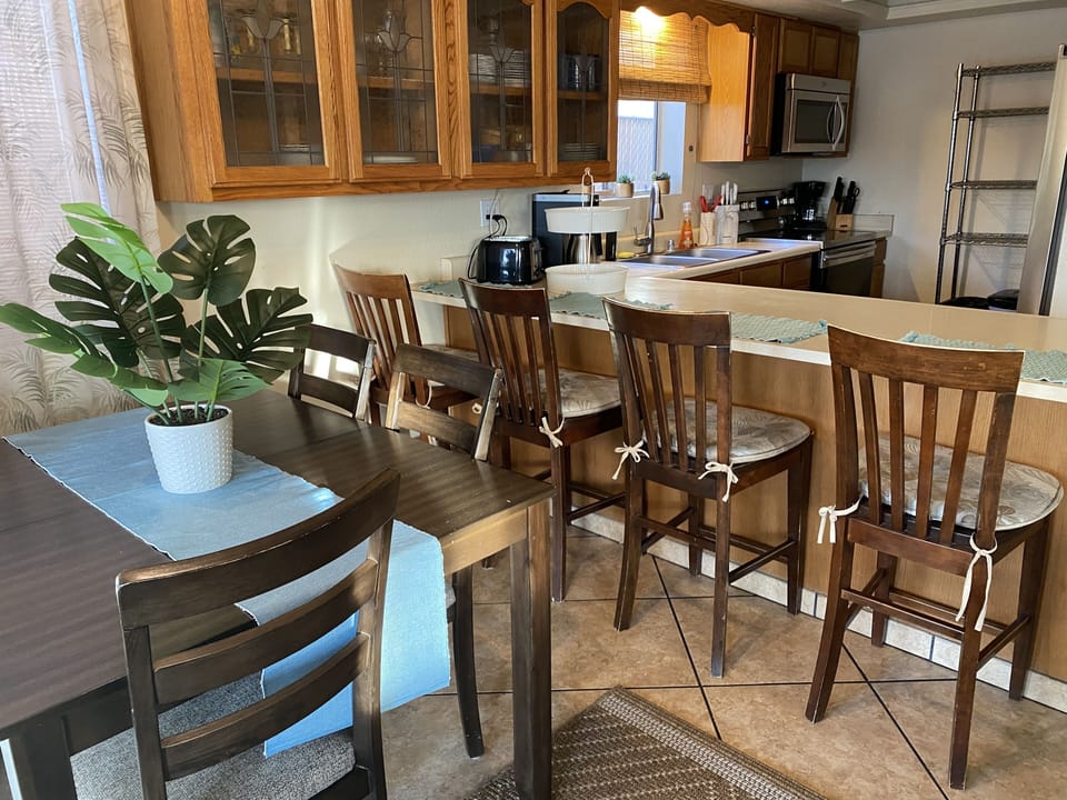 You can prepare meals while looking at the back yard and talking with family 