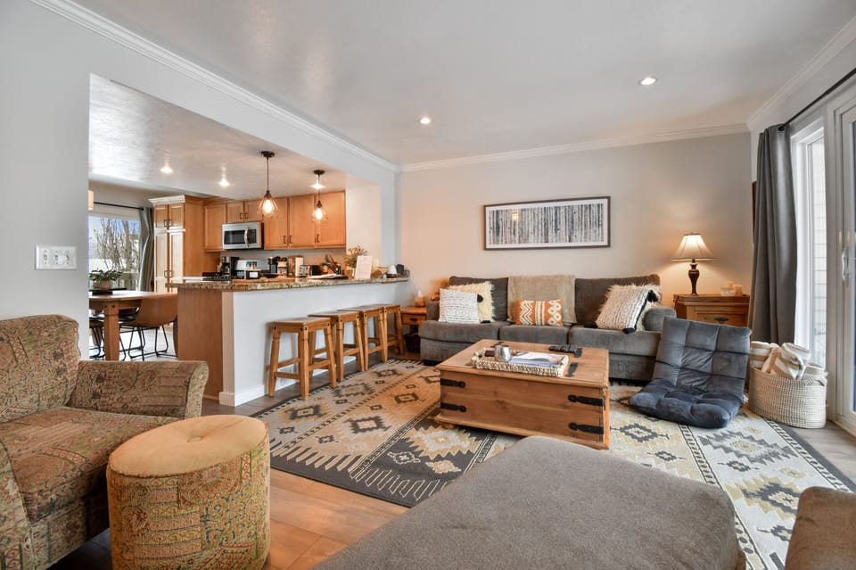 Cozy living area with gas fireplace and TV
