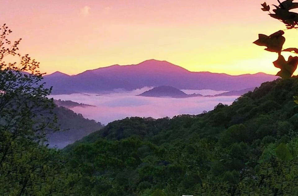Sunrise photo with clouds settled in the valley.