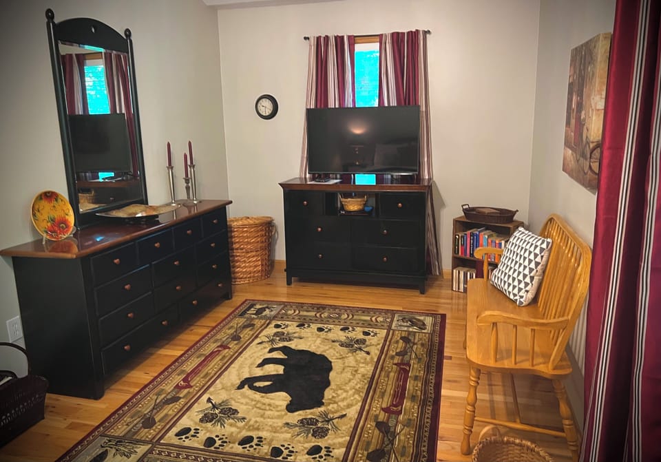 Bedroom also has a triple dresser and smart tv with Hulu.