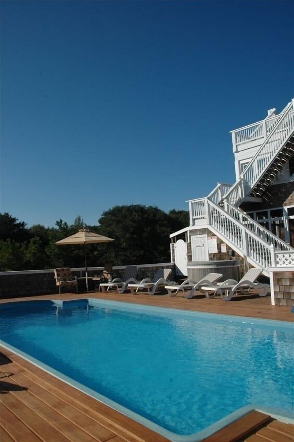 Totally private pool awaits you.  Pool house provides shade and a bath.
