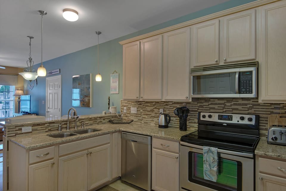 Kitchen has stainless steel appliances and is fully equipped 